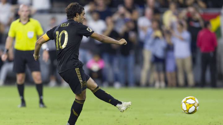 Los Angeles FC forward Carlos Vela shoots a penalty kick for a goal during the second half against Toronto FC at Banc of California Stadium.