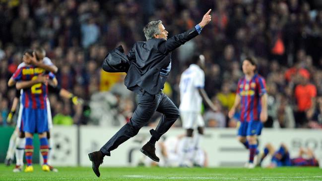 Inter Milan's Portuguese coach Jose Mourinho celebrates after beating Barcelona 3-2 on aggregate.