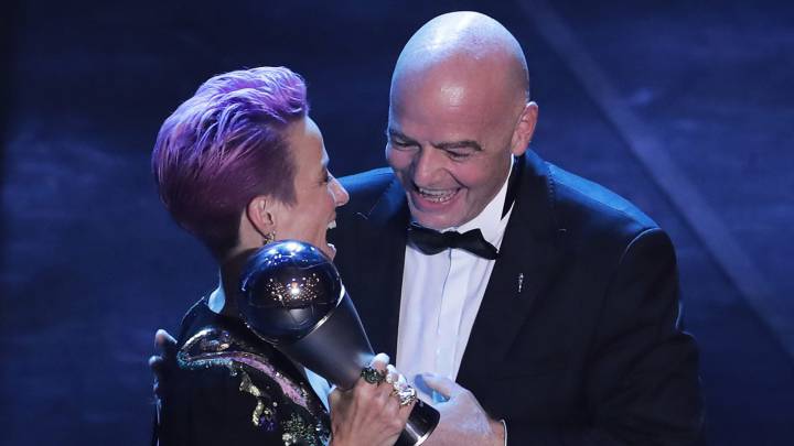 Megan Rapinoe receives The Best FIFA Women's Player of the Year award by FIFA President Gianni Infantino during The Best FIFA Football Awards 2019 at Teatro alla Scala on September 23, 2019 in Milan, Italy.