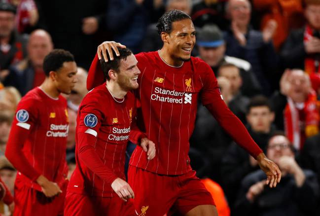 Kids at play | Liverpool's Andrew Robertson celebrates scoring their second goal with Virgil van Dijk.