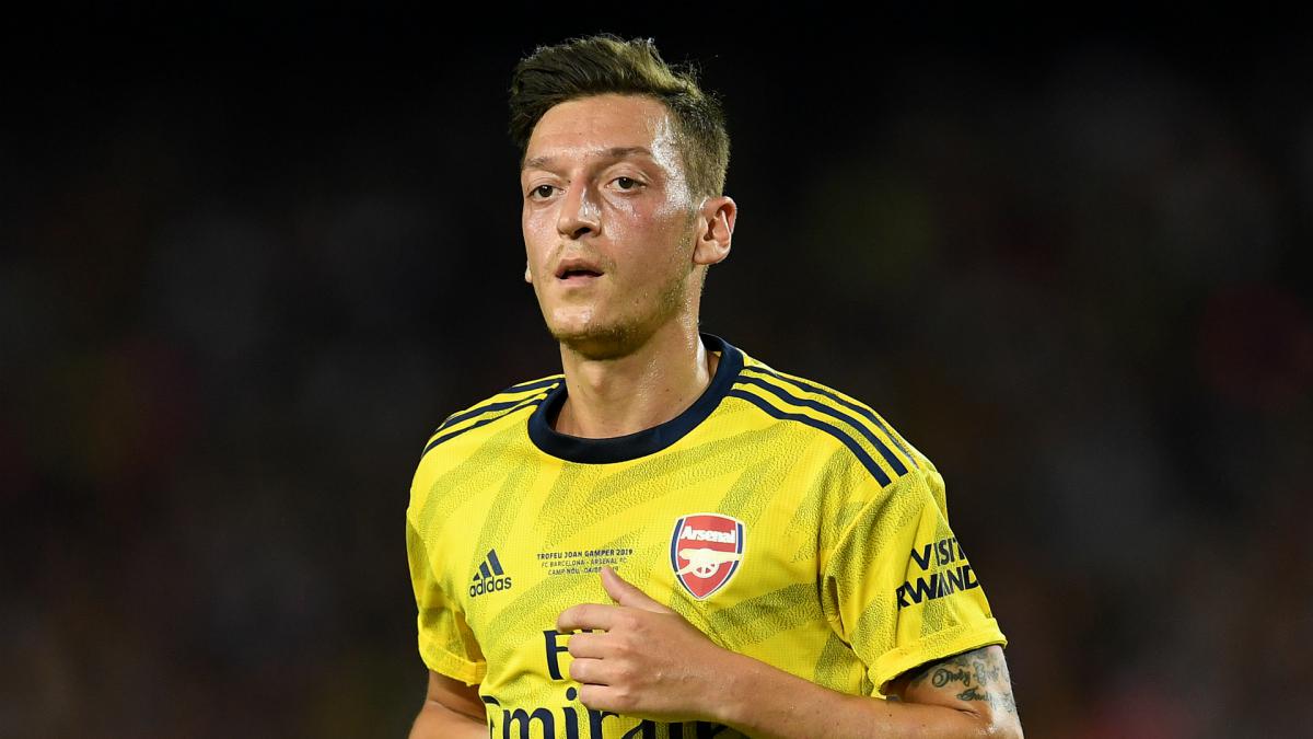 Ozil could come in from cold to captain Arsenal at Anfield