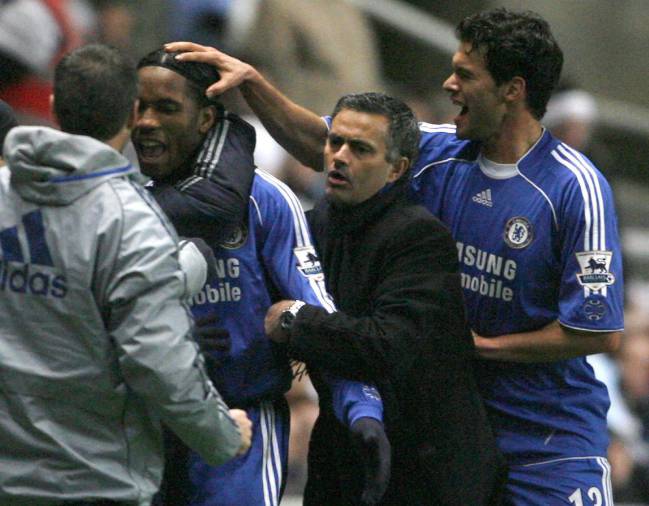On the edge | Chelsea's Didier Drogba celebrates his goal against Newcastle United with manager Jose Mourinho and Michael Ballack.