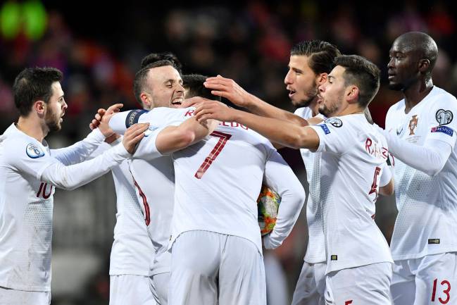 Celebration | Portugal's forward Cristiano Ronaldo sores again.