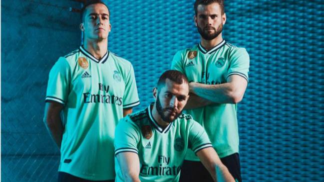 Why are Real Madrid wearing their away green kit at the Bernabéu?