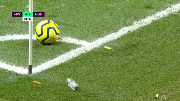 Manchester City fans bombard United players with objects