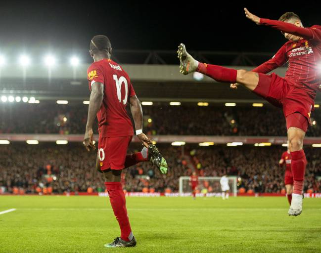Celebrations | Liverpool's Sadio Mane with Roberto Firmino.