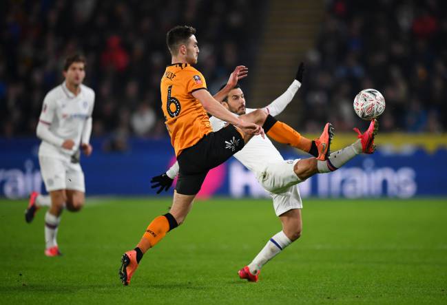 Pedro in action for Chelsea with Robbie McKenzie of Hull City during the FA Cup Fourth Round match.
