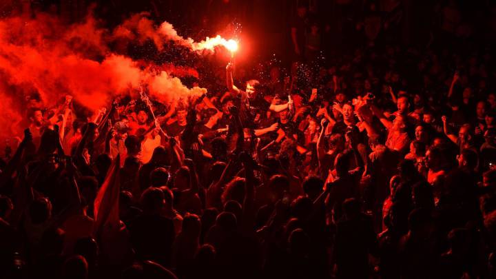 Liverpool glows red as the title party continues into the night