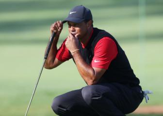 Par-three 12th tames Tiger Woods at Augusta National