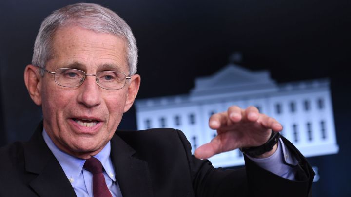 When could covid-19 herd immunity be reached in the US according to Fauci?