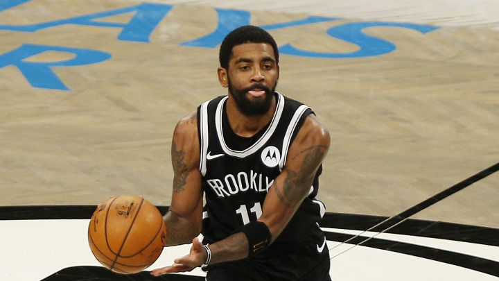 Why is Kyrie Irving currently absent from the Brooklyn Nets?