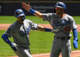 Dodgers halt slump with onslaught, Reds claim epic walk-off win