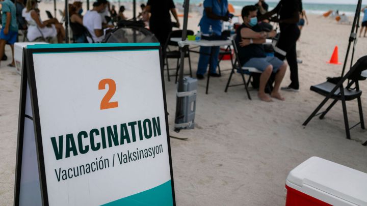 Covid-19 vaccine in the US live updates: efficacy, safety, side effects from Pfizer, J&J, Moderna...