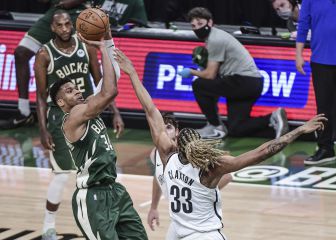 Bucks even series after Net's Iriving exits with ankle injury