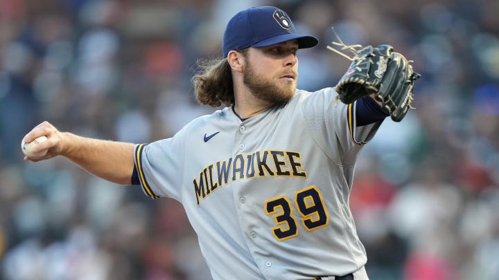 Brewers out-pitch Giants in clash of NL division leaders as Dodgers out-homer Braves