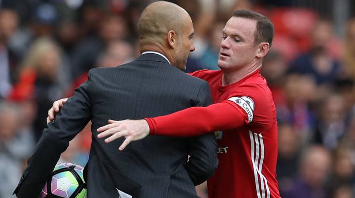 Guardiola doesn't immediately give the ball back to Rooney.