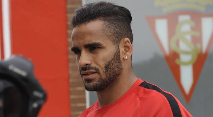 Douglas injures backside asleep on team bus