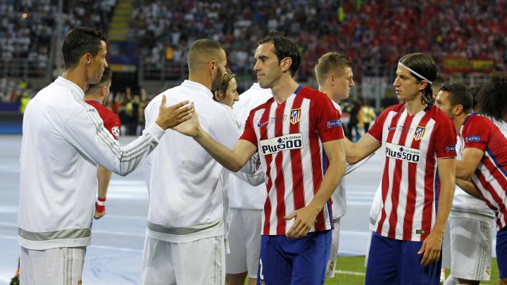 Saludo de Atlético y Real Madrid en Milán.