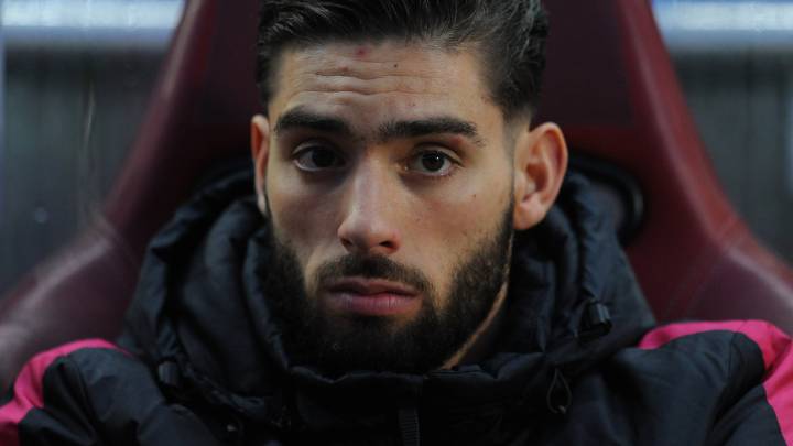 Carrasco, en el banquillo durante un partido del Atlético de Madrid.