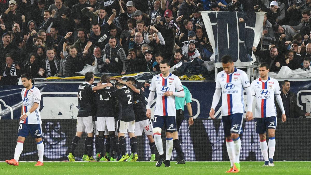 Bordeaux's players celebrate after their Argentinian midfielder Valentin Vada (hidden) scored a goal during the French L1 footbal match between Bordeaux (FCGB) and Lyon (OL) on March 3, 2017, at the Matmut Atlantique Stadium in Bordeaux, southwestern France.