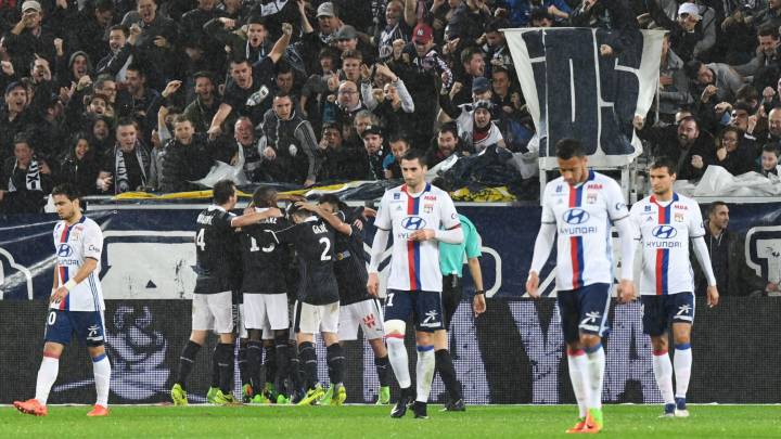 Bordeaux's players celebrate after their Argentinian midfielder Valentin Vada (hidden) scored a goal during the French L1 footbal match between Bordeaux (FCGB) and Lyon (OL) on March 3, 2017, at the Matmut Atlantique Stadium in Bordeaux, southwestern France.