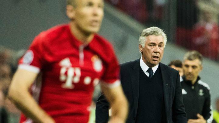 Bayern Munich's Italian head coach Carlo Ancelotti watches a throw inn during the first-leg quarter final Champions league football match between Bayern Munich and Real Madrid at the Allianz Arena in Munich on April 12, 2017.