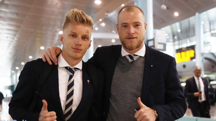 El danés Daniel Wass y el sueco John Guidetti
