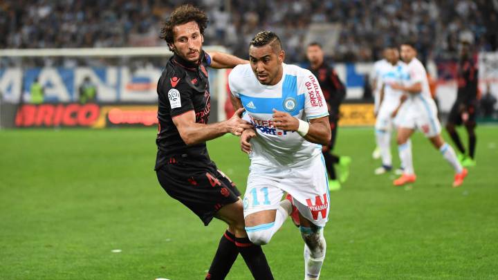 Dimitri Payet ante Paul Baysse.