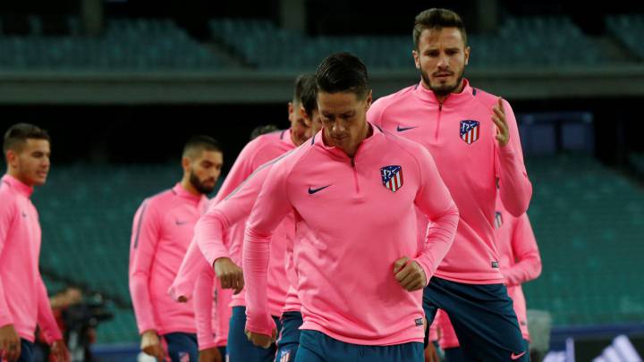 Los jugadores del Atlético durante el entrenamiento.