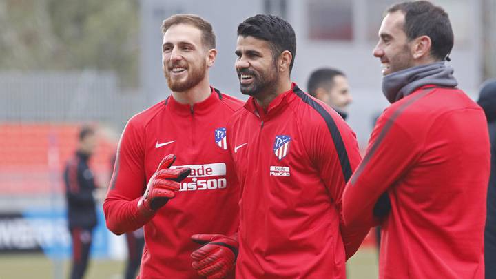 Oblak, Costa y Godín, en la sesión del Atlético de esta mañana. Los tres serán titulares ante el Getafe.