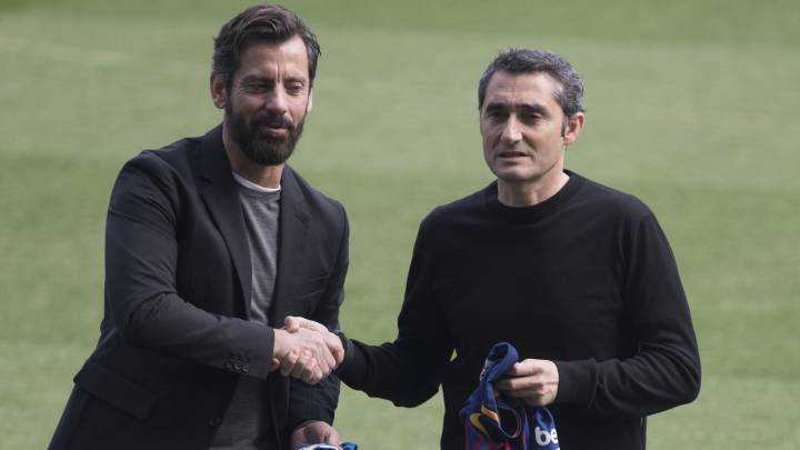 Quique y Valverde volvieron a escenificar su excelente relación con la fotografía de entrenadores, ayer, en Cornellà-El Prat.