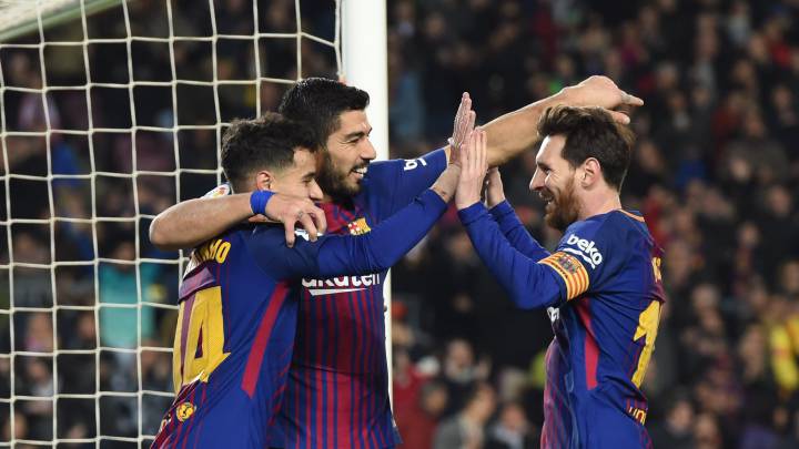 Los jugadores del Barça, lanzados al título.