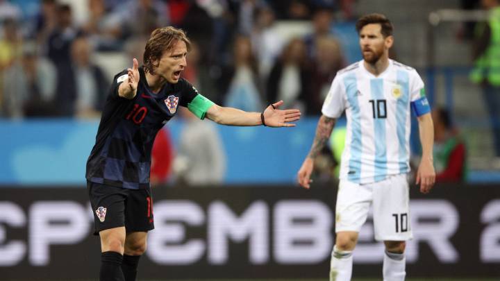 Luka Modric y Leo Messi.