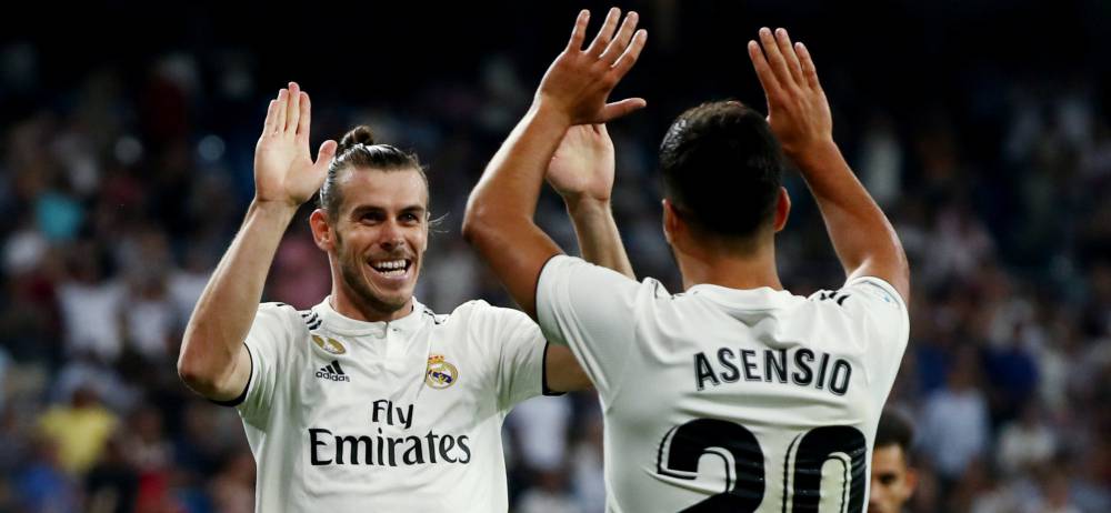 Bale y Asensio celebran el segundo gol del Madrid.