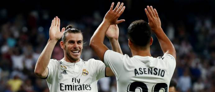 Bale y Asensio celebran el segundo gol del Madrid.