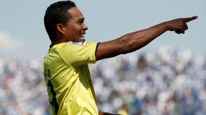 El jugador del Villarreal Bacca celebra su gol ante del Leganés, que les adelanta en el marcador, durante el partido de la cuarta jornada de liga de Primera División que enfrenta a ambos equipos en el estadio Butarque de la localidad madrileña.