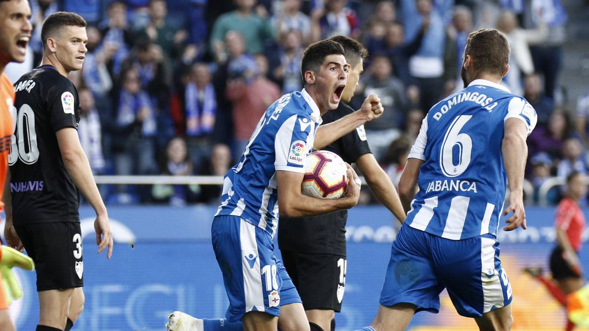 Carlos, celebrando su gol al Málaga.