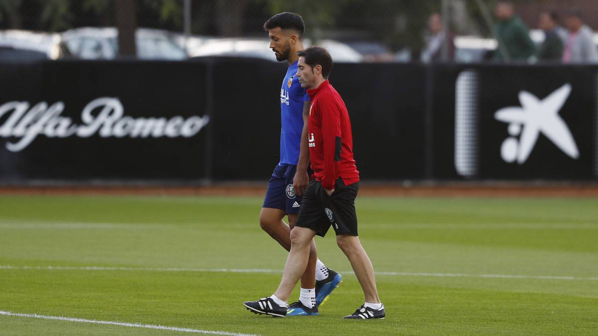 Marcelino, con Garay.