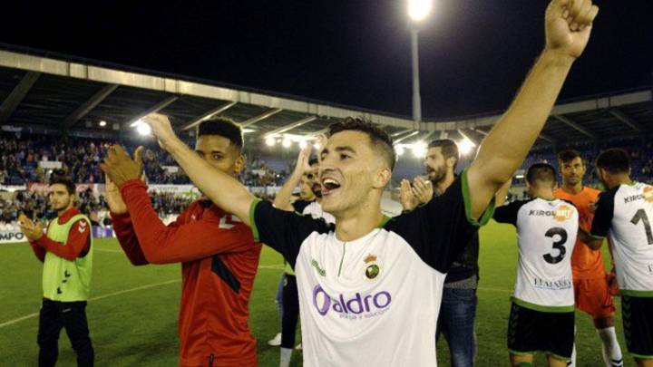 Un jugador del Racing celebra el pase