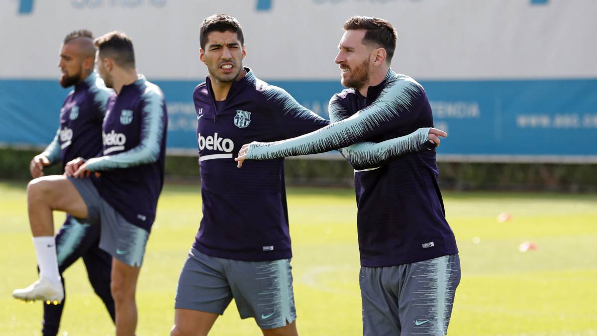 El argentino Leo Messi, junto al delantero uruguayo Luis Suárez, durante un entrenamiento del Barcelona celebrado esta semana.