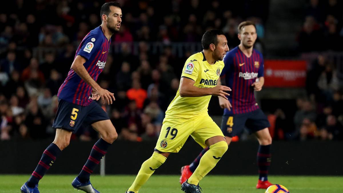 Cazorla con Busquets y Rakitic