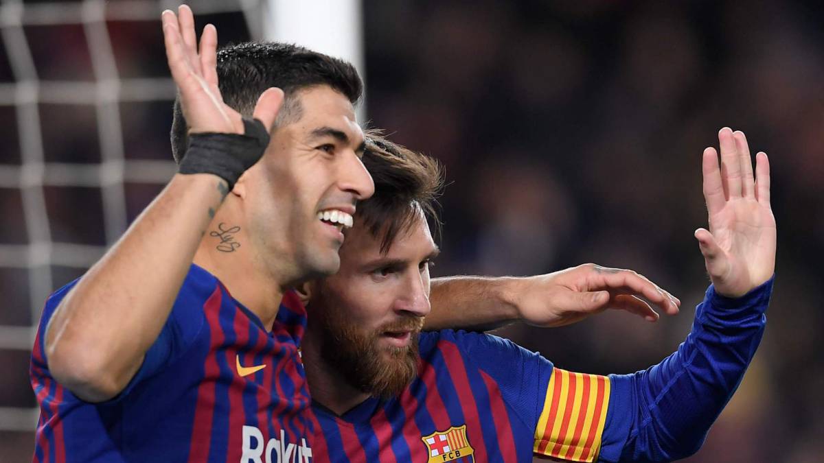 Los delantero del Barcelona, Luis Suárez y Lionel Messi, durante un partido.