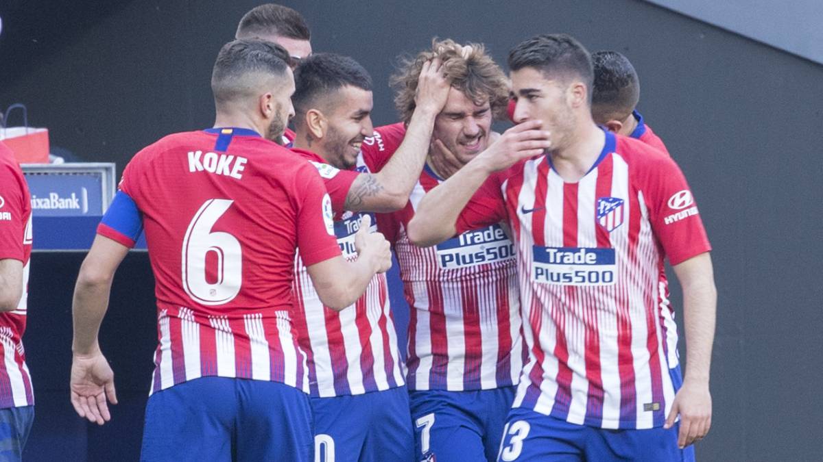 Los jugadores del Atlético celebran el gol de Griezmann al Celta.
