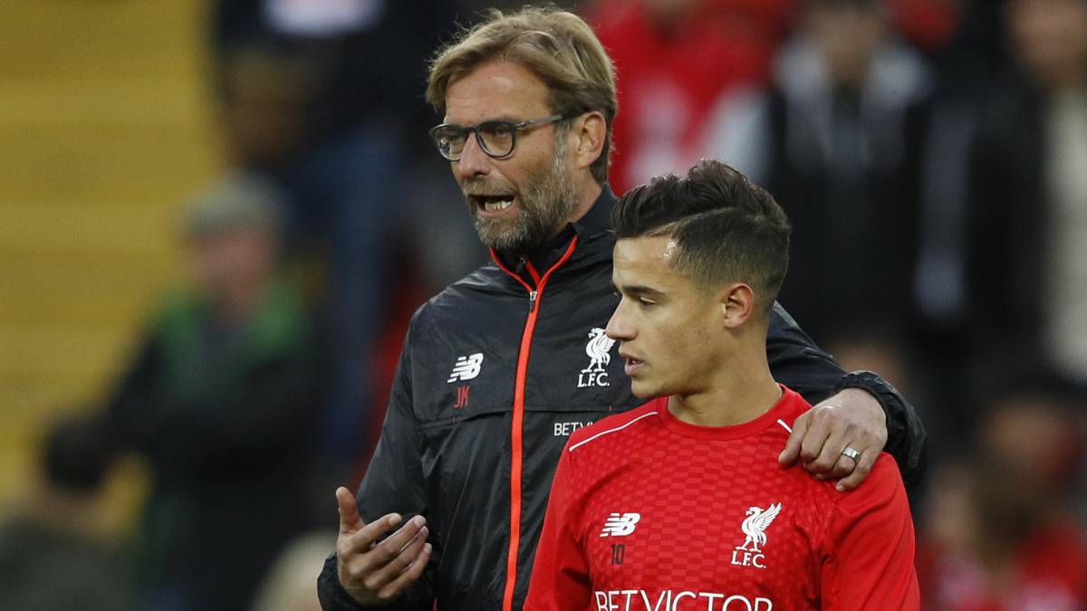 El entrenador alemán, Jürgen Klopp, y el futbolista brasileño, Philippe Coutinho, juntos en el Liverpool.