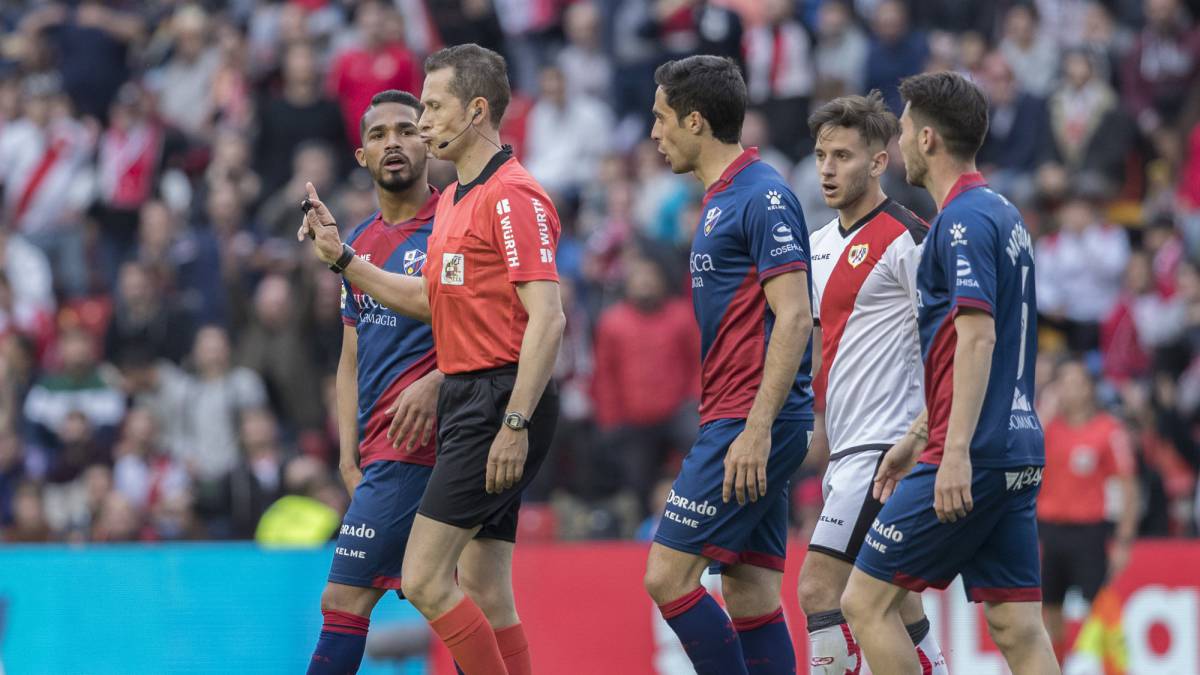 González González, junto a Medrán en el Rayo-Huesca.