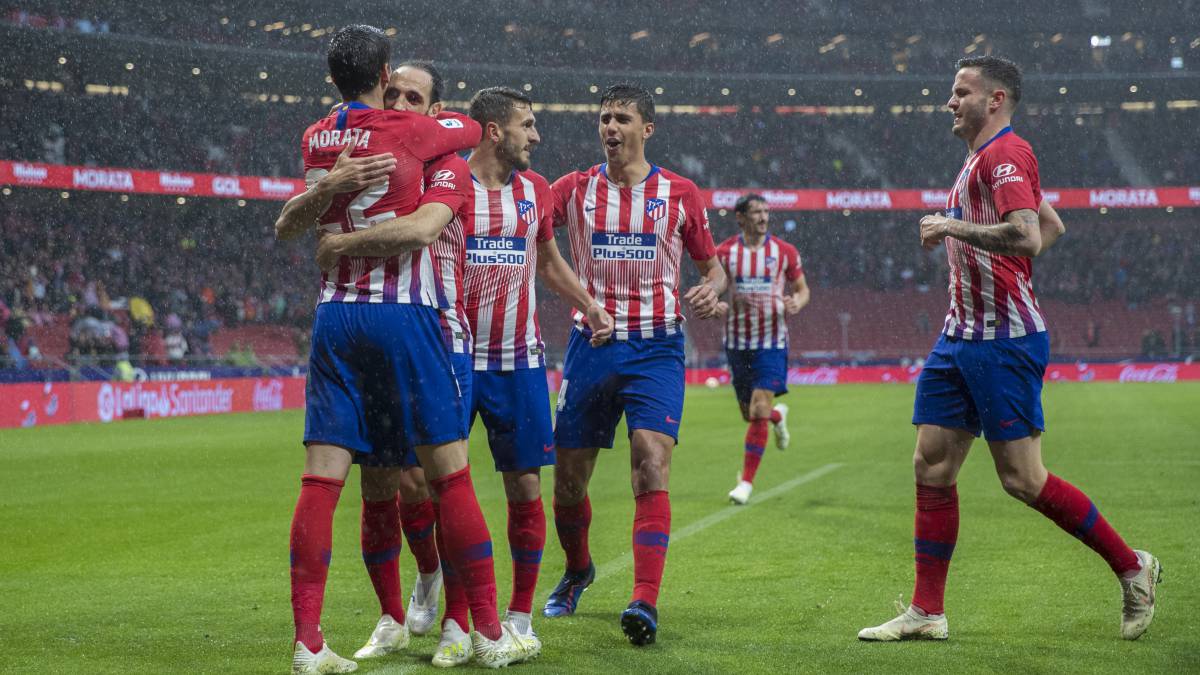 Morata, Juanfran, Koke, Rodrigo y Saúl celebran un gol al Valencia.