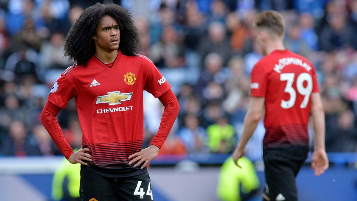 Los jugadores del Manchester United, Tahith Ching y Scott McTomminay, durante un partido.