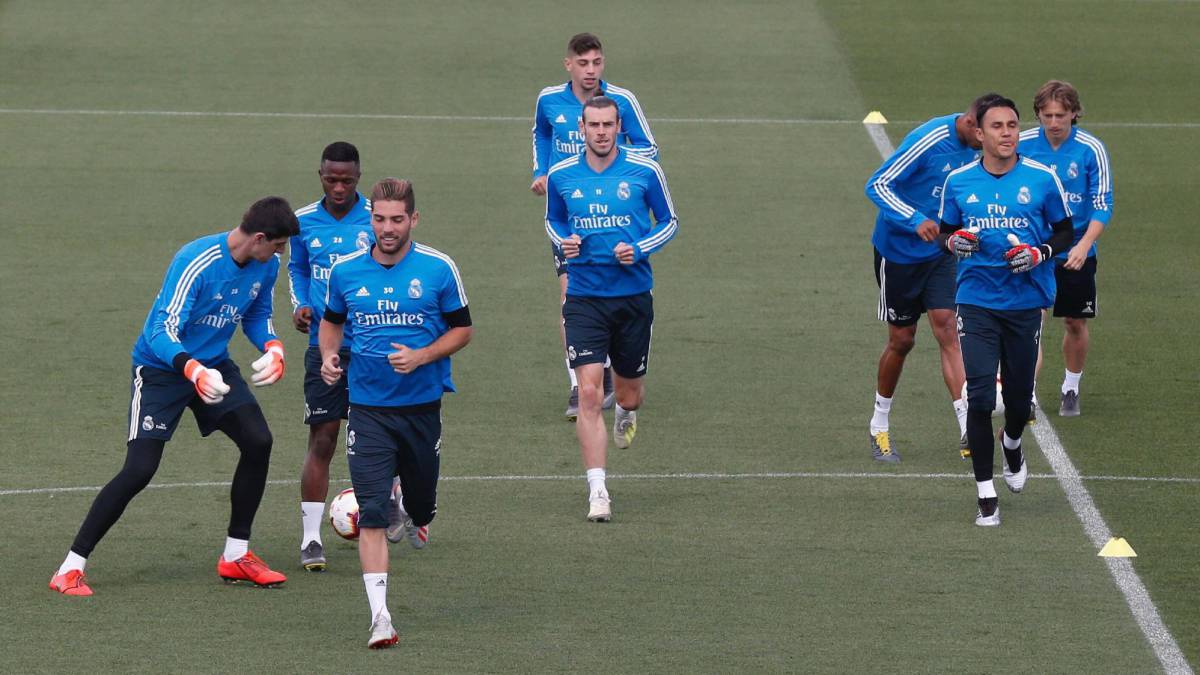 Bale y Keylor, en su último entrenamiento del año en Valdebebas.