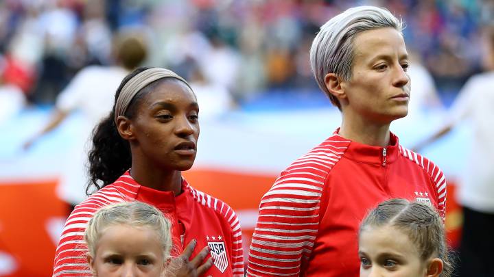 LE HAVRE, FRANCE - JUNE 20: Megan Rapinoe of the USA refuses to sing the national anthem out of protest prior to the 2019 FIFA Women's World Cup France group F match between Sweden and USA at Stade Oceane on June 20, 2019 in Le Havre, France. (Photo by Martin Rose/Getty Images)