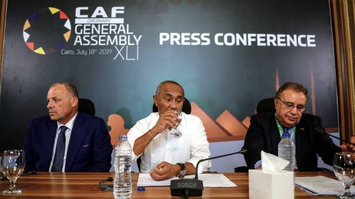 Confederation of African Football (CAF) President Ahmad Ahmad (C) attends a press conference in Cairo on July 18, 2019 on the eve of the 2019 football Africa Cup of Nations (CAN) Final between Senegal and Algeria. (Photo by Mohamed el-Shahed / AFP)